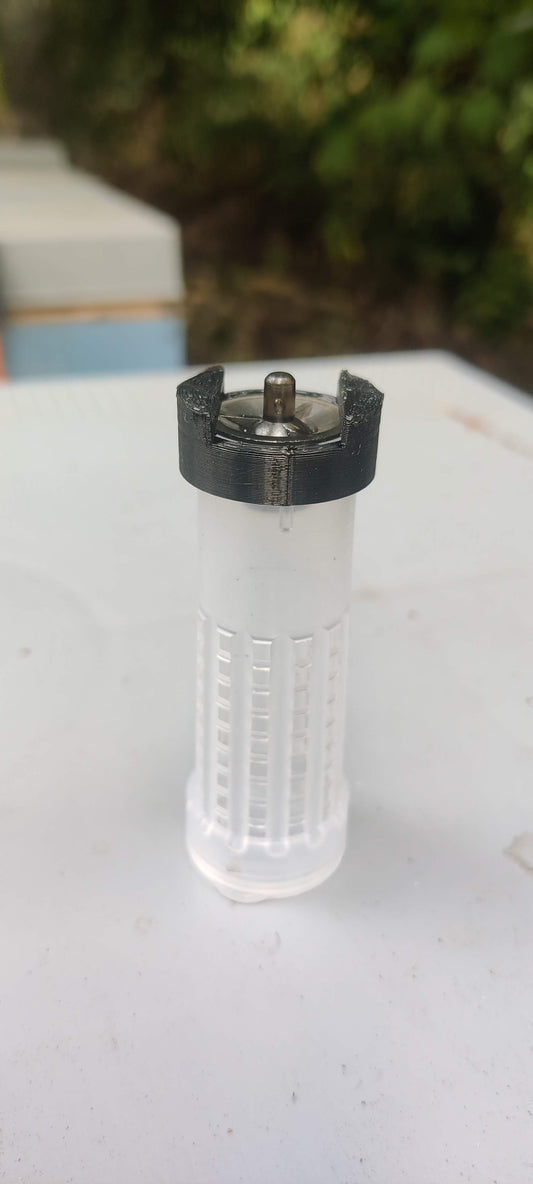 JZBZ cup secured to a Nicot roller cage by the adapter